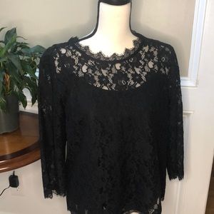Talbots black lacy top with black silky lining.
